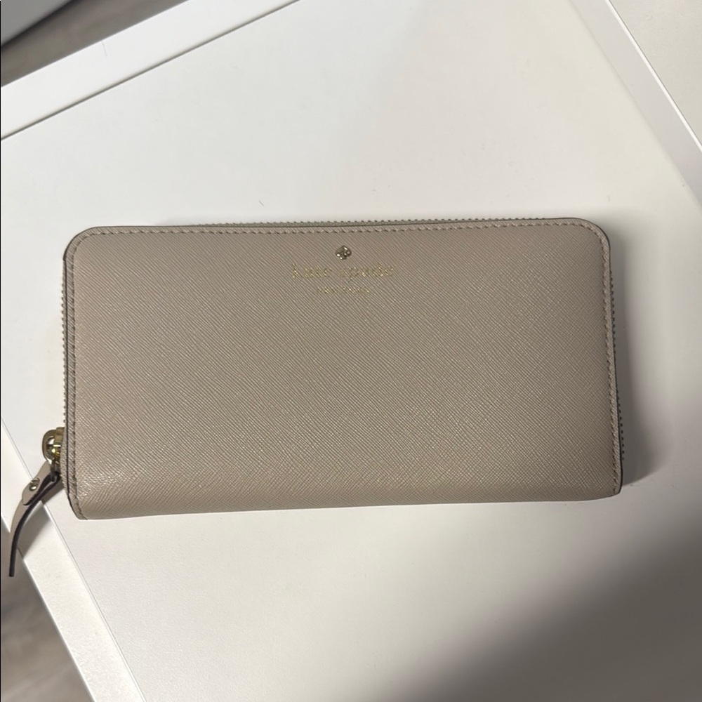 kate spade beige zip-around leather wallet